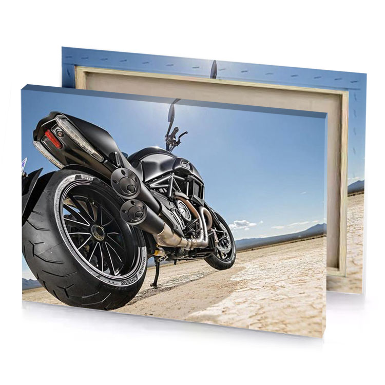 a motorcycle parked on the side of road light steel blue canvas