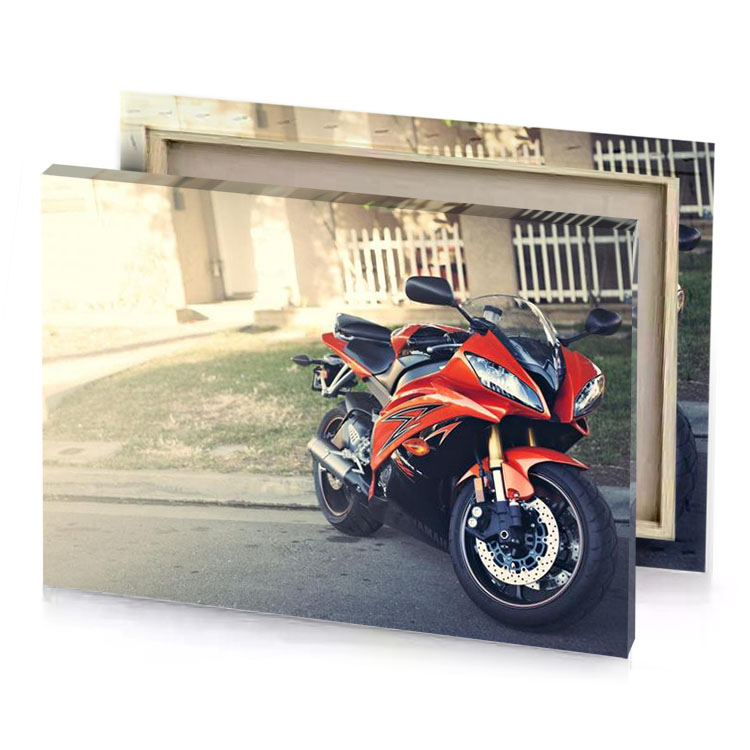 a motorcycle parked on the side of road rosy brown canvas