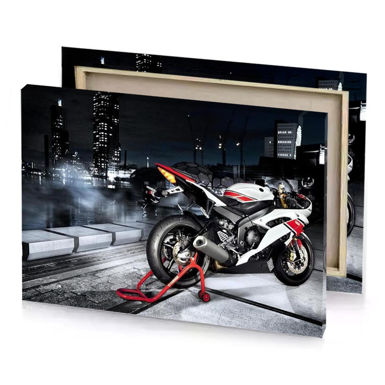 a motorcycle parked on the side of road silver canvas