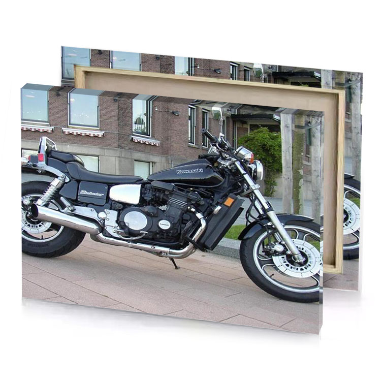 a motorcycle parked on the side of street charcoal canvas
