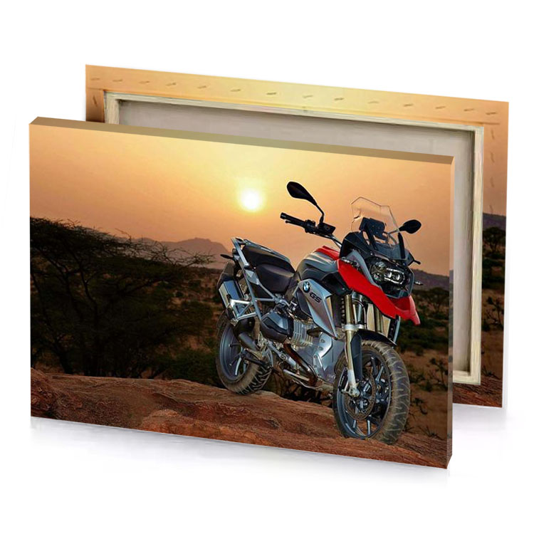 a motorcycle parked on top of rock smoky black canvas