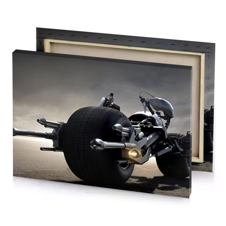 a motorcycle with large wheel on it smoky black canvas
