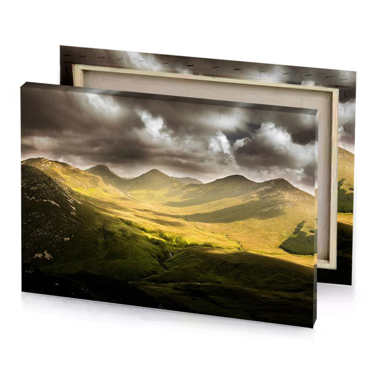 a mountain range with cloudy sky above fawn canvas
