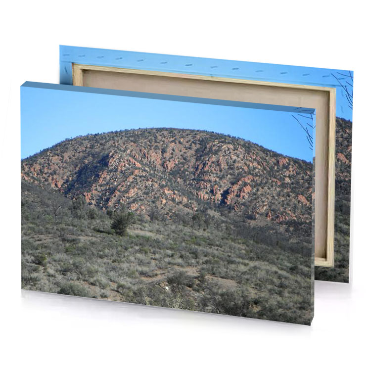 a mountain with very steep slope camouflage green canvas