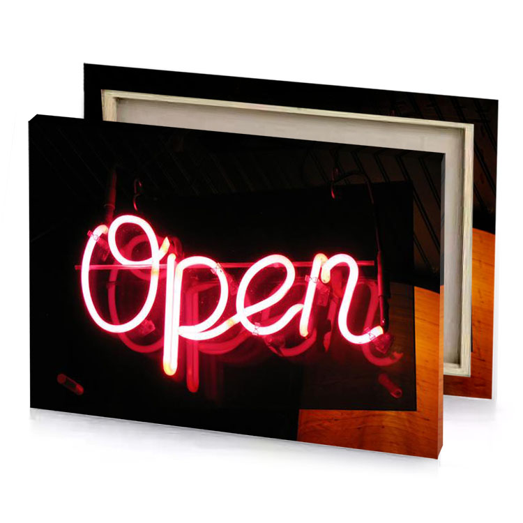 a neon sign that says open crimson canvas
