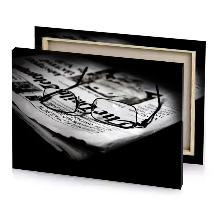 a newspaper with glasses on it platinum canvas