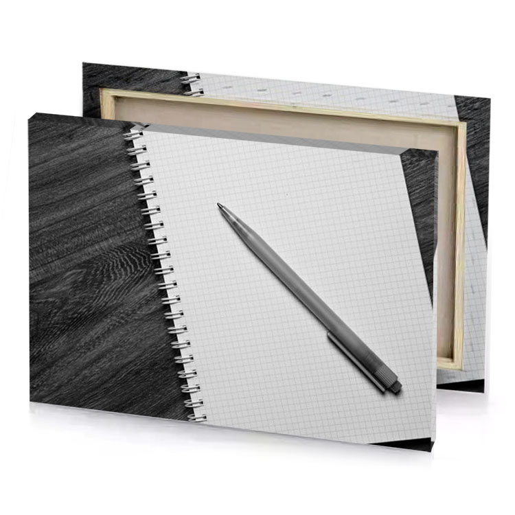 a notebook with pen on top of it gainsboro canvas