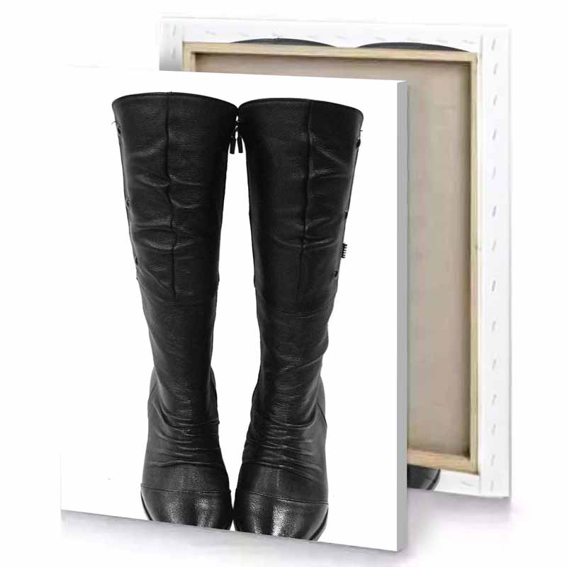 a pair of black leather boots with buckles smoky canvas