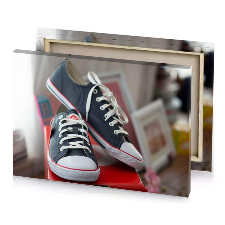 a pair of shoes sitting on top box taupe canvas