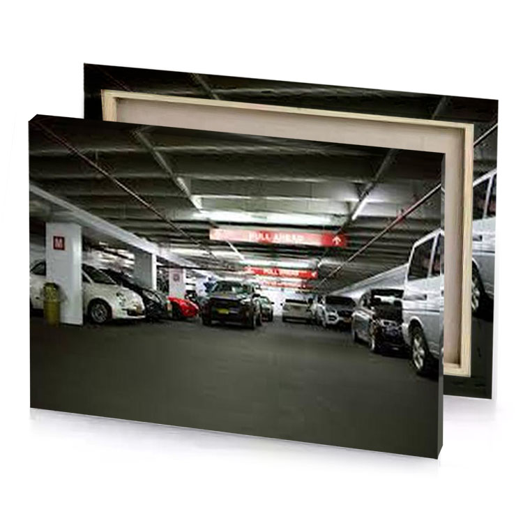 a parking with cars parked in it charcoal canvas