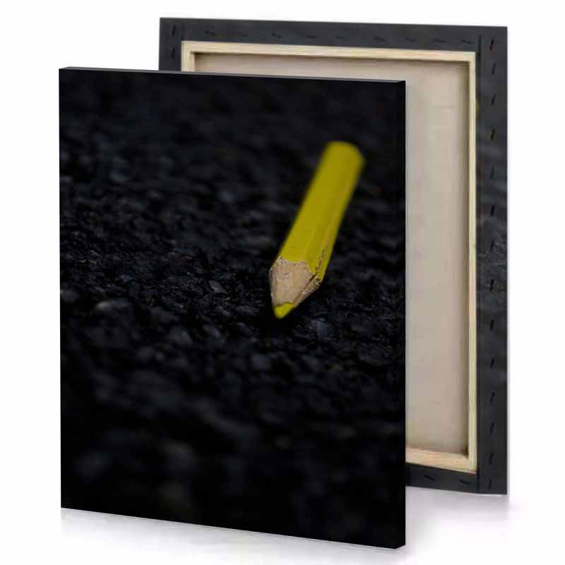 a pencil laying on the ground dark golden rod canvas