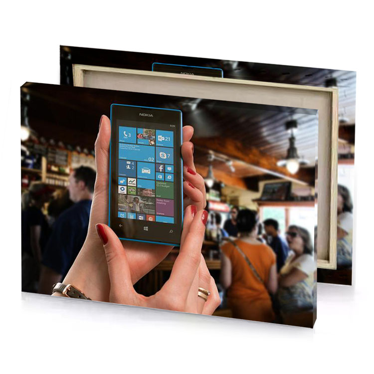 a person holding cell phone in their hand rosy brown canvas
