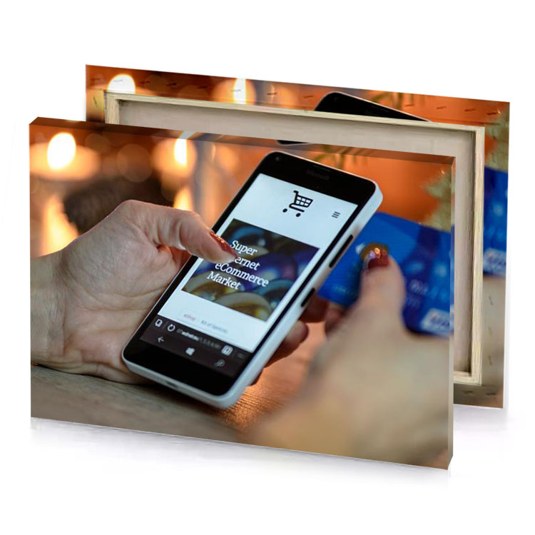 a person holding cell phone with credit card in their powder blue canvas