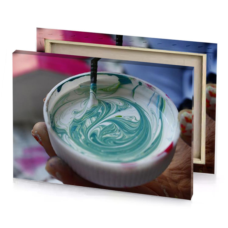 a person holding paintbrush in their hand viridian canvas