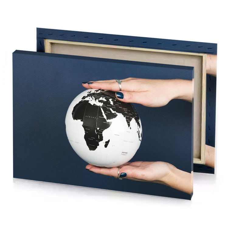 a person holding small globe in their hands white smoke canvas