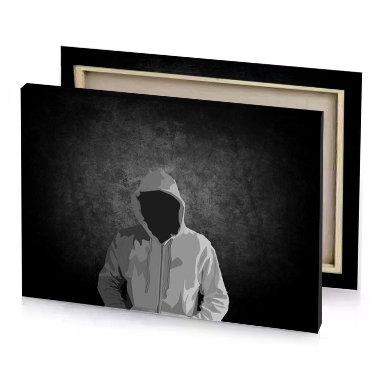 a person in white hoodie standing front of dark wall charcoal canvas