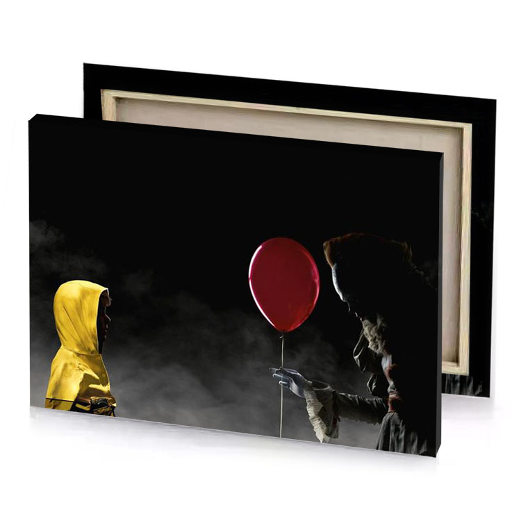 a person in yellow raincoat holding red balloon burgundy canvas