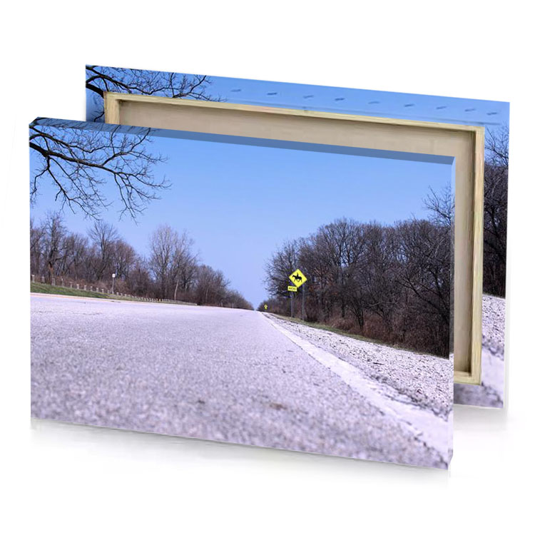 a person is flying kite on road light steel blue canvas