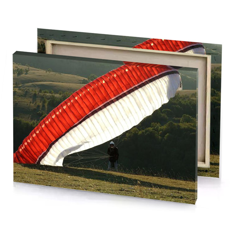 a person is flying large red and white kite lust canvas