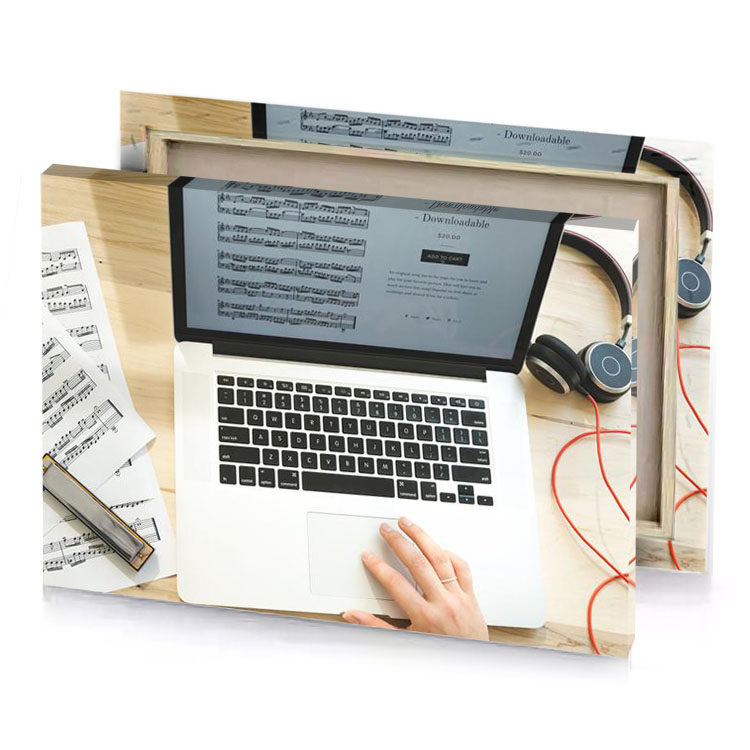 a person is typing on laptop with headphones manatee canvas