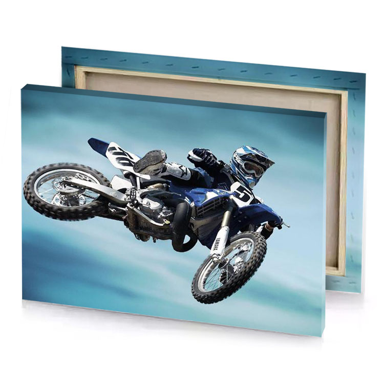 a person on motorcycle in the air smoky black canvas