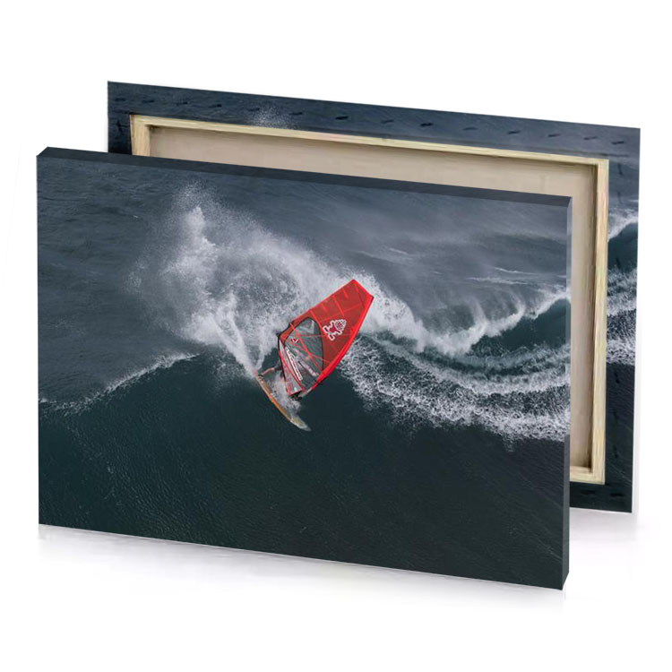 a person on surf board riding wave garnet canvas