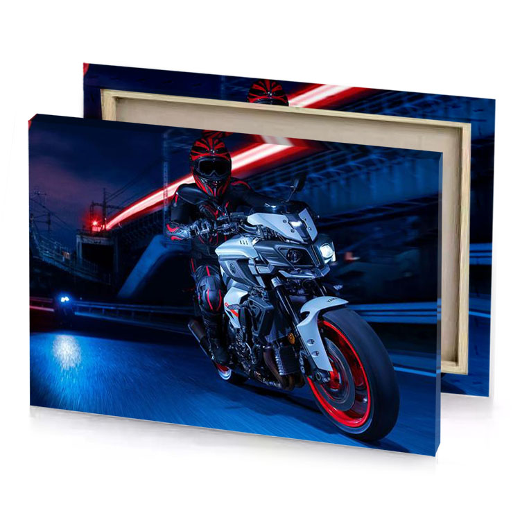 a person riding motorcycle on city street steel blue canvas
