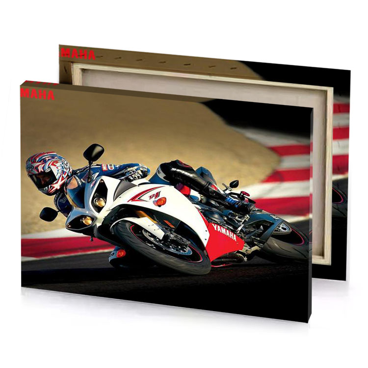 a person riding motorcycle on track dark khaki canvas