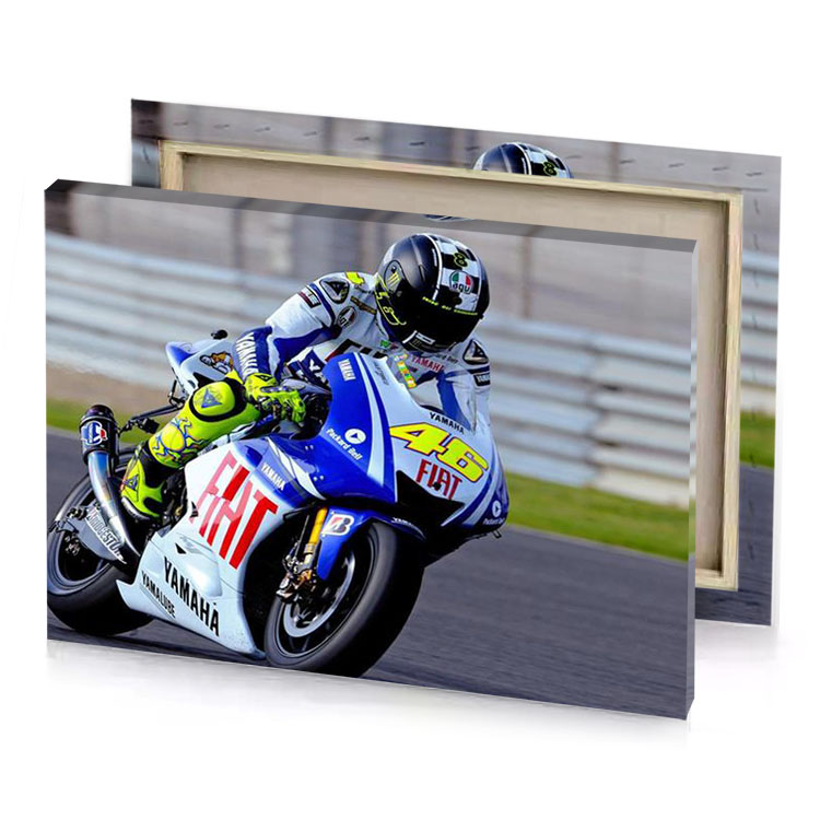 a person riding motorcycle on track medium blue canvas