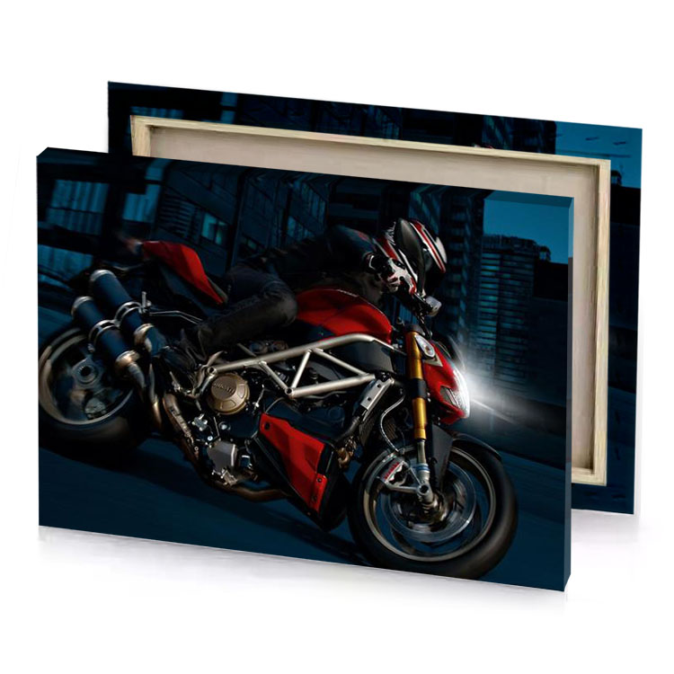 a person riding red motorcycle on city street smoky black canvas