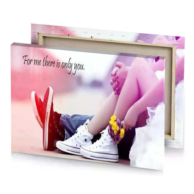 a person sitting on bench with pair of shoes rosy brown canvas