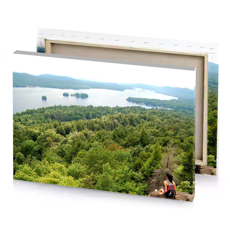 a person sitting on top of mountain olive drab canvas