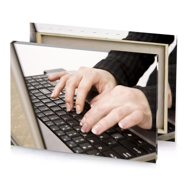 a person typing on laptop keyboard apricot canvas