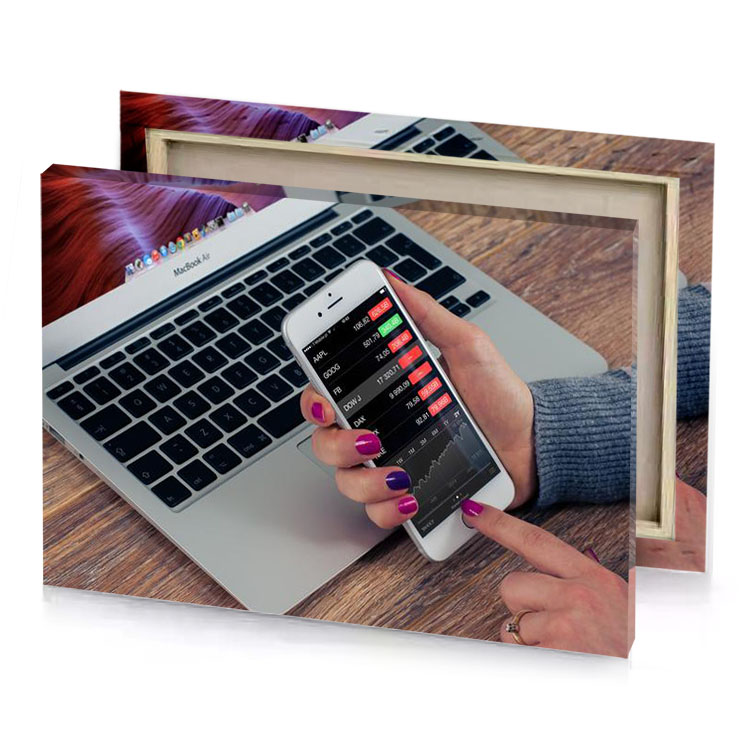 a person using cell phone on laptop smoky black canvas
