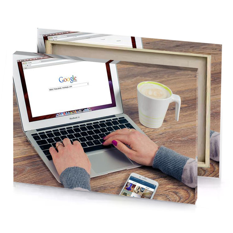 a person using laptop computer and cell rosy brown canvas
