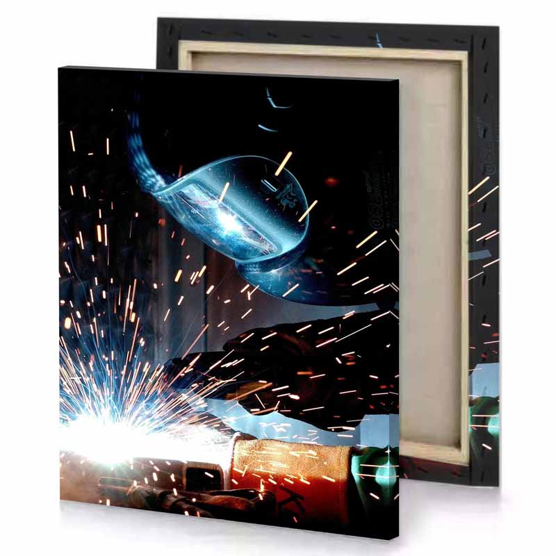 a person welding piece of metal taupe canvas