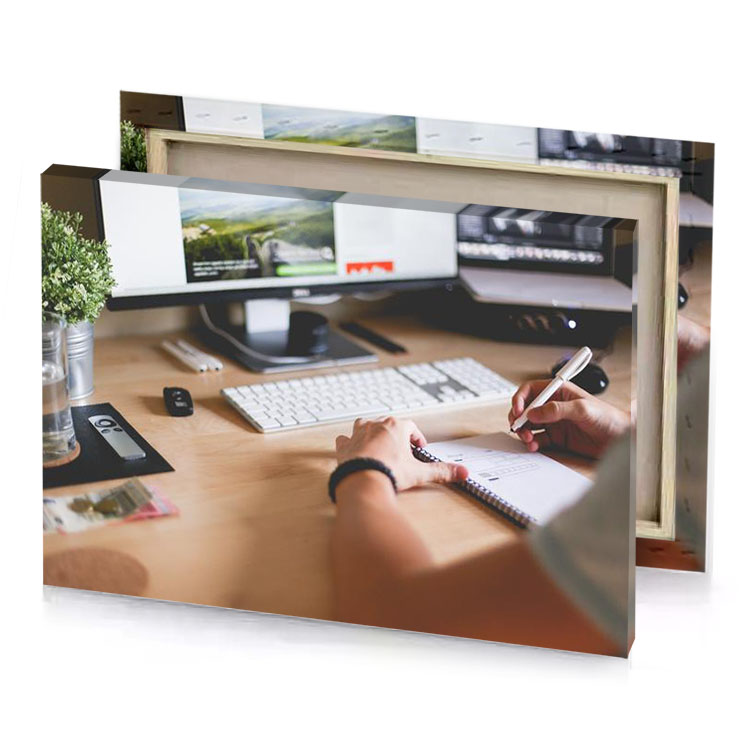 a person writing on piece of paper at desk rosy brown canvas