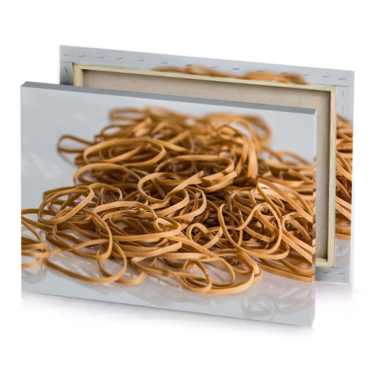 a pile of brown rubber bands sepia canvas