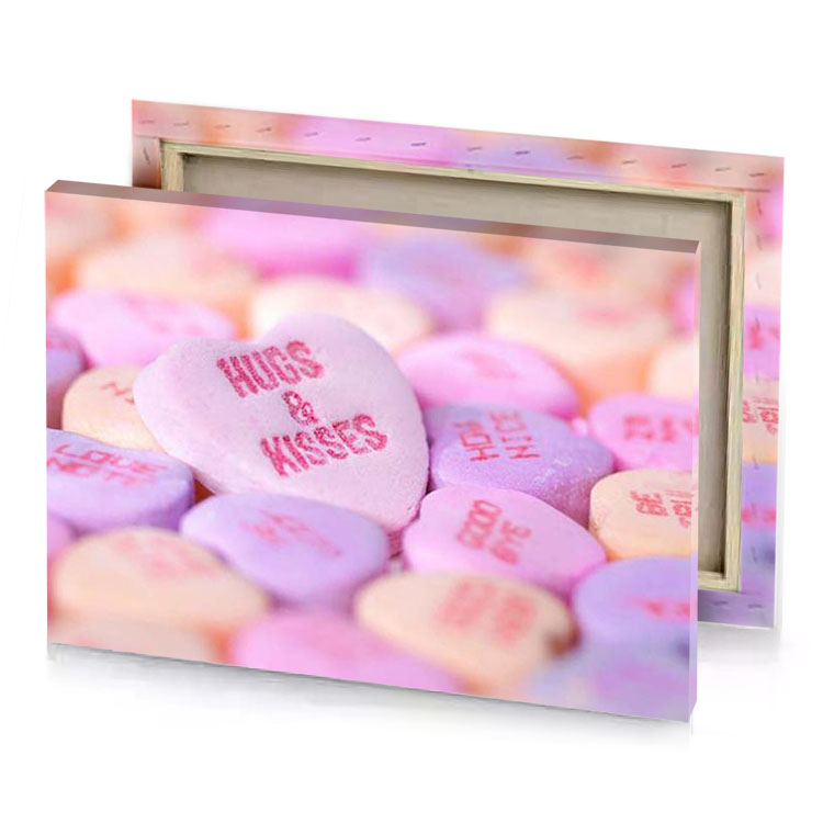 a pile of conversation hearts thistle canvas