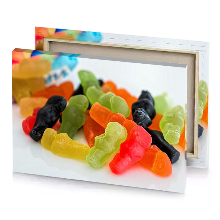 a pile of gums on white surface flame canvas