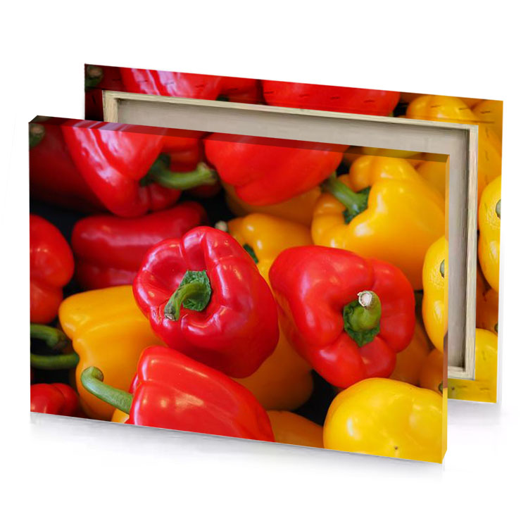 a pile of red and yellow peppers lust canvas