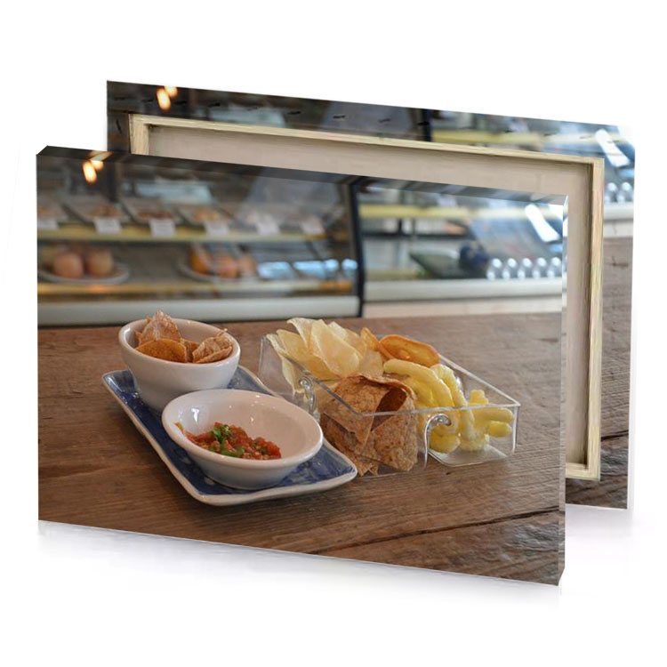 a plate of chips and bowl salsa sienna canvas