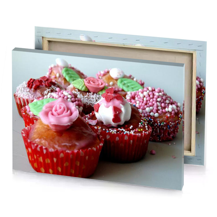 a plate of cupcakes with pink frosting and sprinngs burgundy canvas