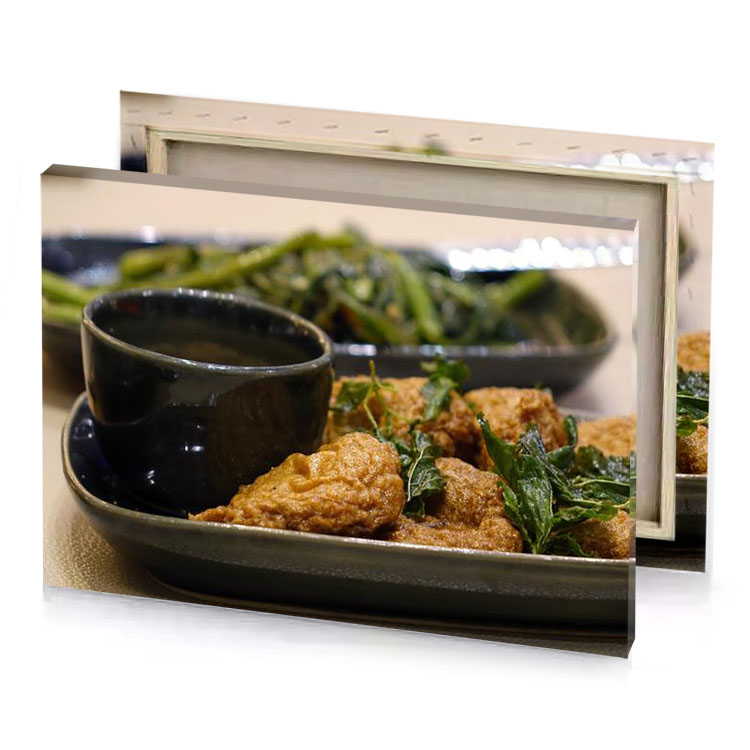 a plate of food with bowl sauce and brocco peru canvas