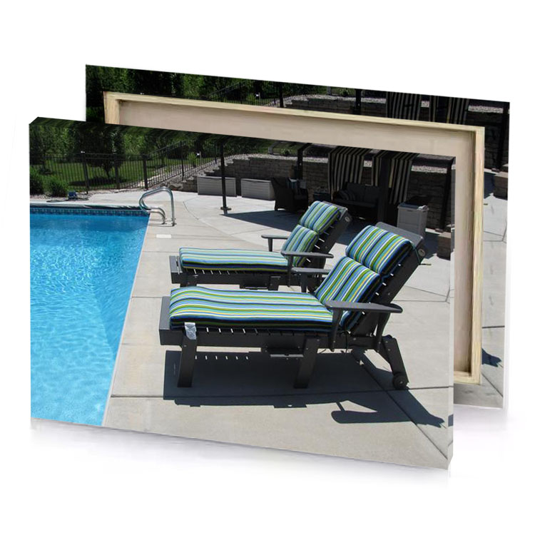 a pool with chair and in the background silver canvas