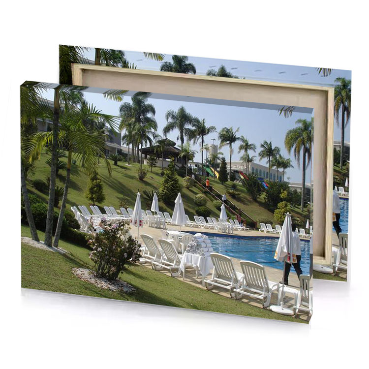 a pool with chairs and umbrellas next to swimming silver canvas