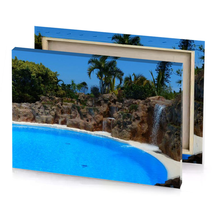 a pool with waterfall and dodger blue canvas