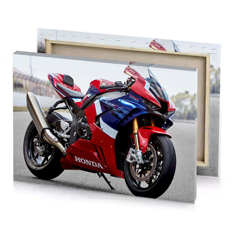 a red and blue motorcycle parked on street maroon canvas