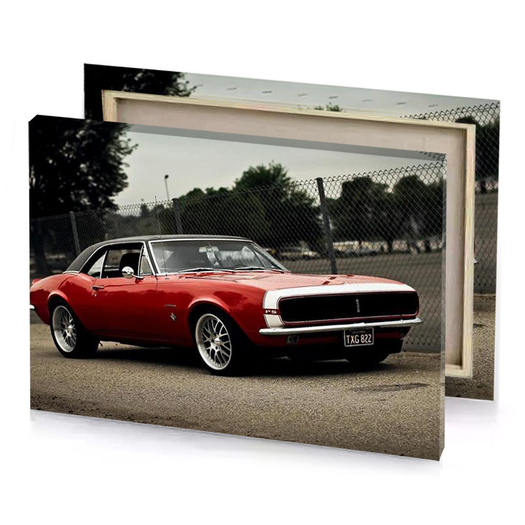 a red car parked on dirt road maroon canvas