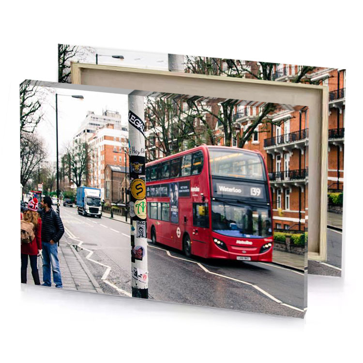 a red double decker bus brown canvas